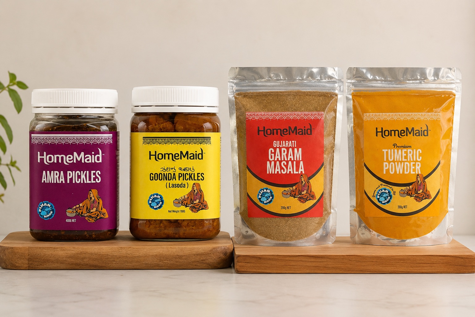 HomeMaid Amra and Goonda pickle jars with Garam Masala and Turmeric Powder pouches