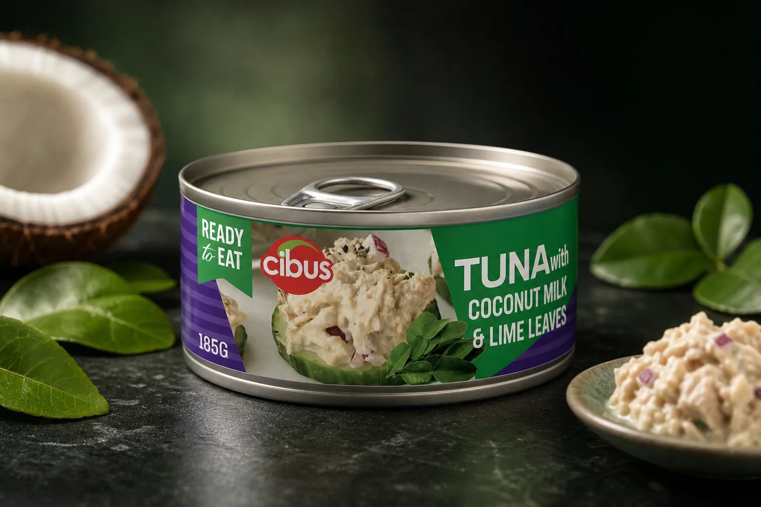 Premium studio photograph of Cibus tuna with coconut milk and lime leaves
